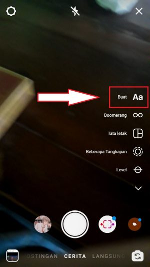 Cara membuat tulisan bergerak di Instagram story 2 tap ikon Aa